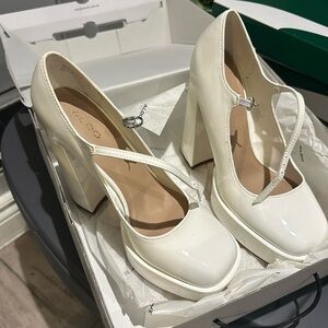 Brand new Aldo chunky high heels, patent white.